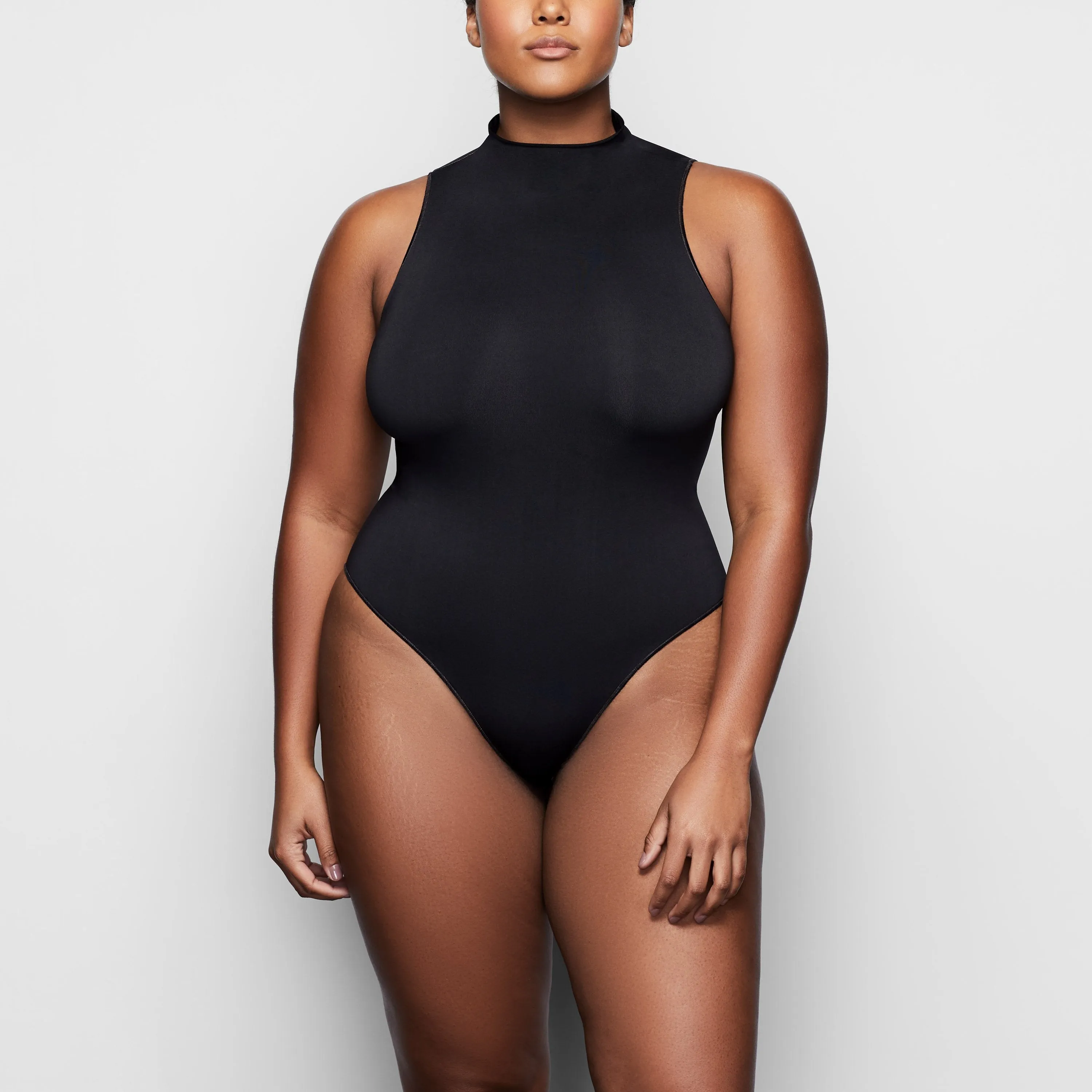 ESSENTIAL MOCK NECK SLEEVELESS BODYSUIT | ONYX